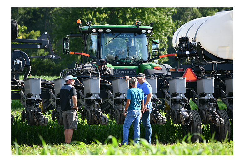 Farmers helping farmers photo